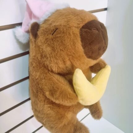 Peluche de capibara dormilón con luna y estrella